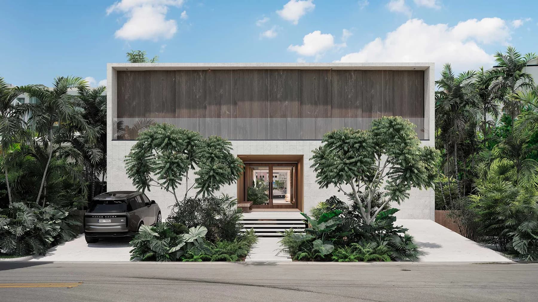 Exterior of the Broadview residence built by LUXOM in Miami, a low horizontal volume over a reflecting pool