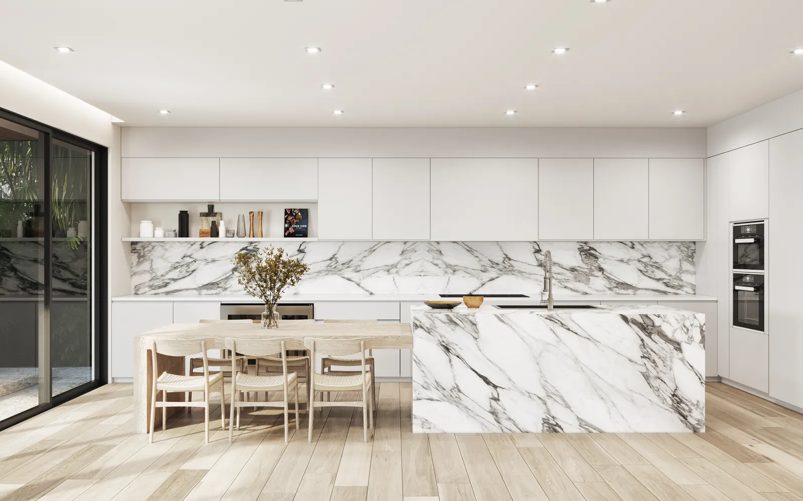 White kitchen with a continuous veined marble slab backsplash along the back wall and a matching marble waterfall island, with a dining table and wood floors, in the Pinta residence by LUXOM, Miami
